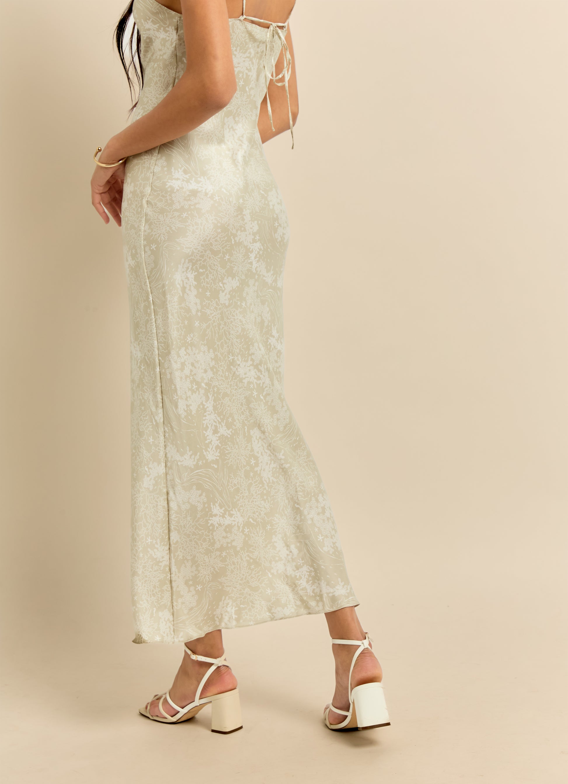 Classic 90's style silk slip dress in beige and white print.
