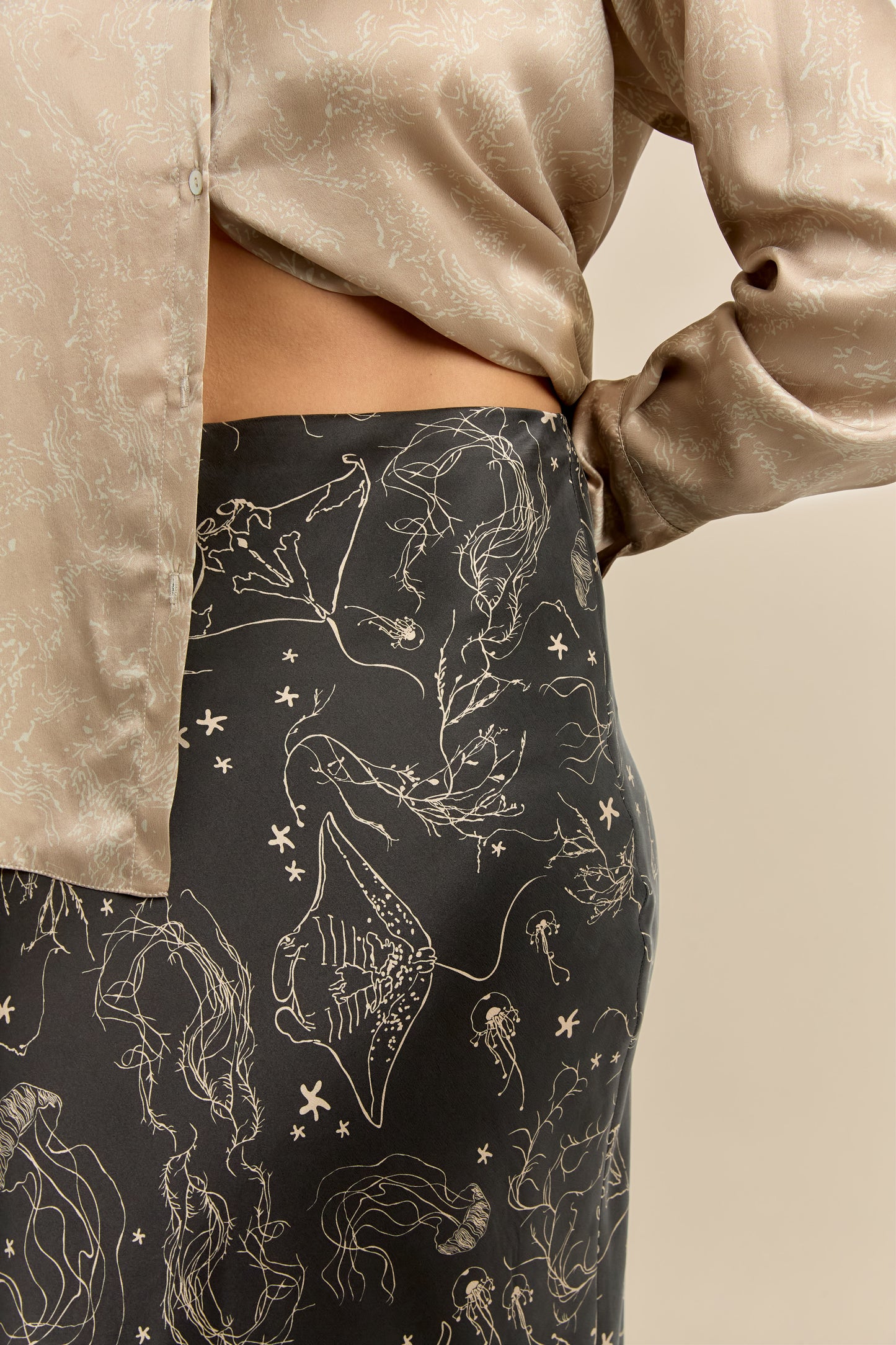 Black silk with gold print on midi slip skirt