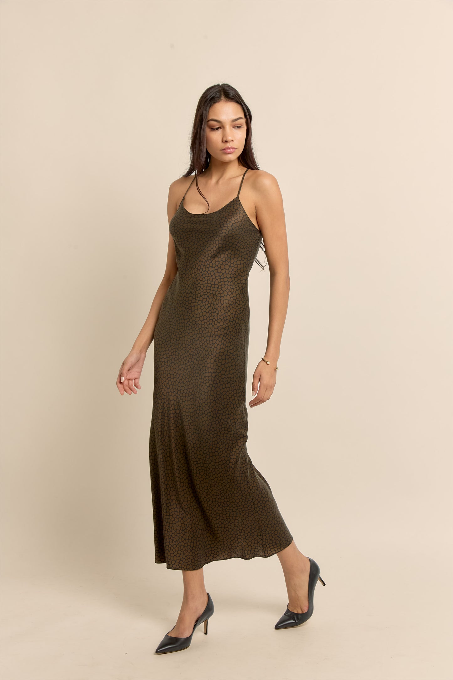 Midi silk slip dress featuring brown and black animal print, bias cut for a beautiful drape.