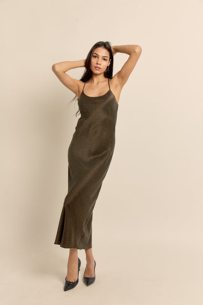 90's style midi silk slip dress featuring brown and black animal print and scoop neckline. 
