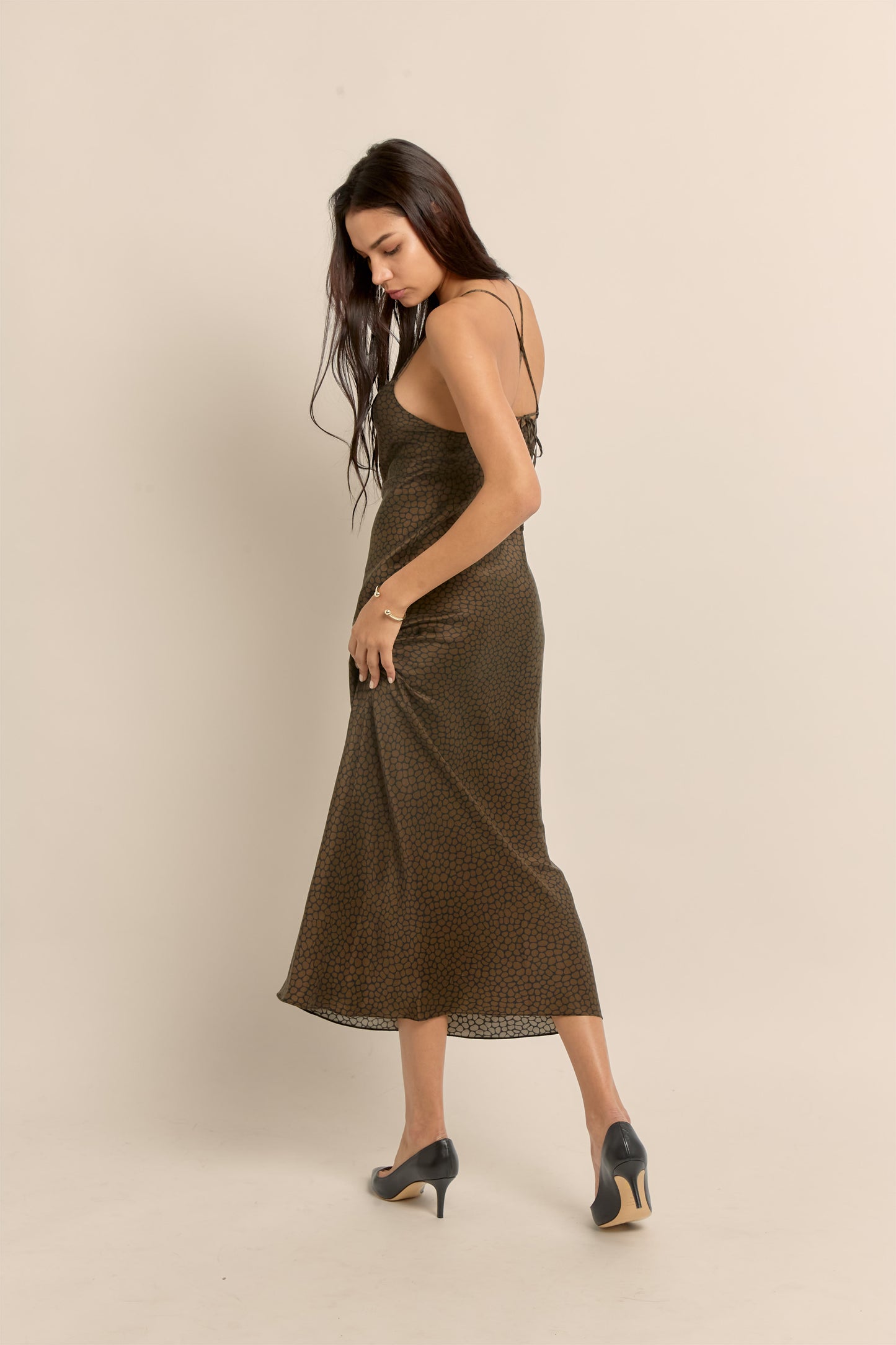 Black and brown animal print silk slip dress worn styled for everyday luxury to evenings out.