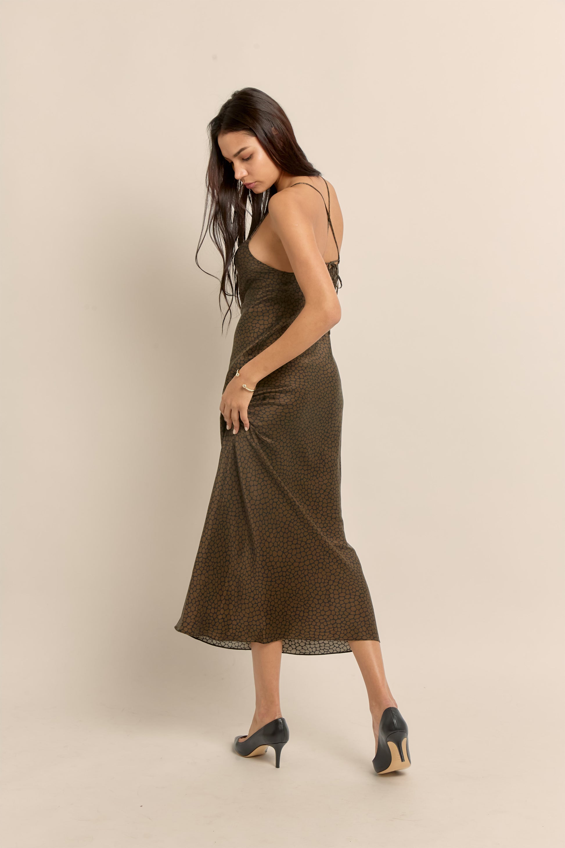 Black and brown animal print silk slip dress worn styled for everyday luxury to evenings out.